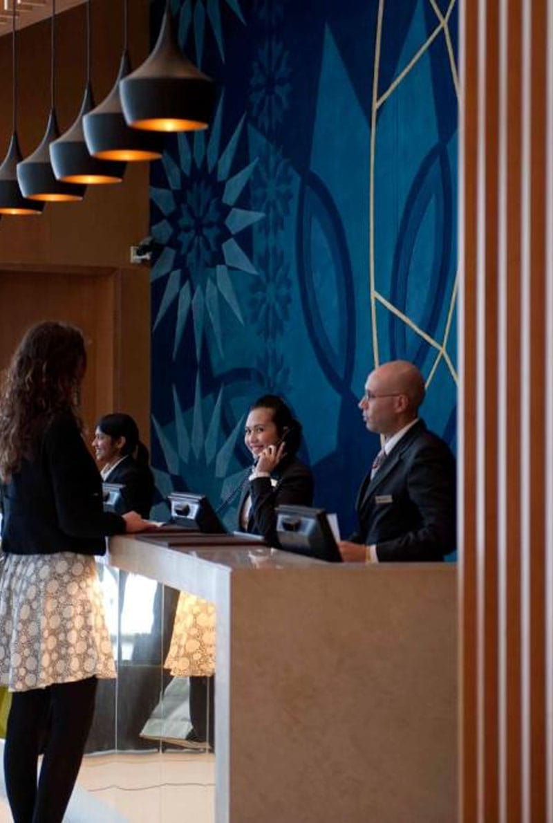 Reception area and Front desk Officer in the lobby of Abu Dhabi Hotel