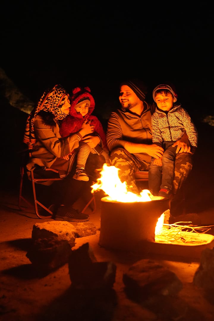 Family Enjoying bonfire in Out Out